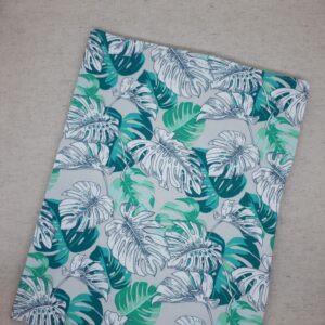 Pochette textile format A4 motif Monstera sur fond vert fermée recto
